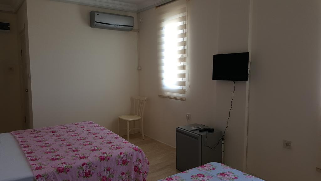 Yali Pansiyon Ilica Alaçatı Bilik gambar